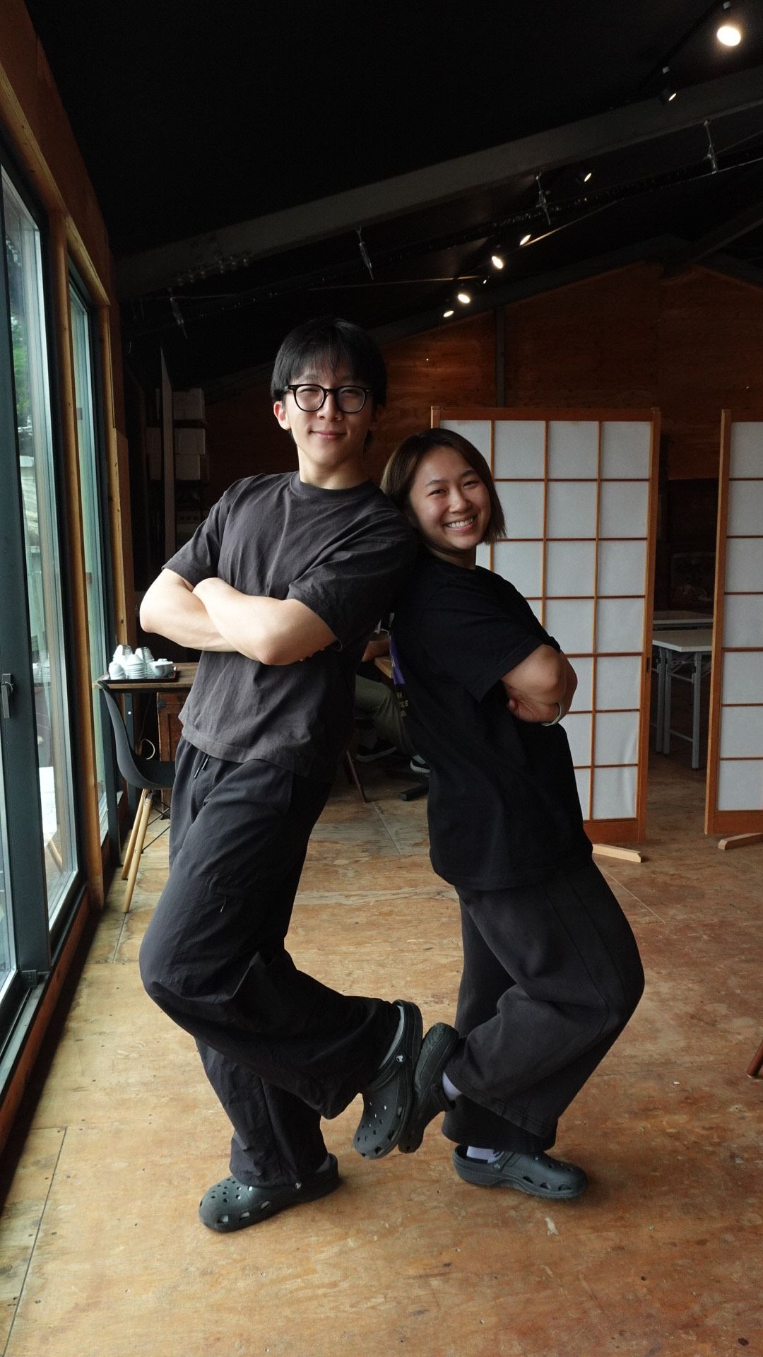 David and Tran posing together as twins.